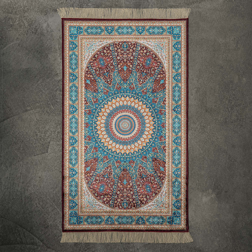 Casual prayer mat with a red and teal dome medallion and cream fringe, full view